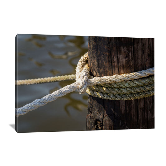 Canvas wall art featuring a close up view of a weathered mooring post
