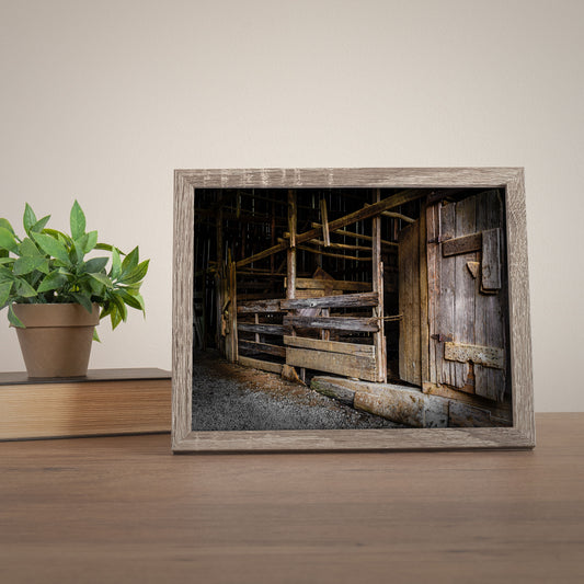 Rustic wall art featuring the interior of an old abandoned barn