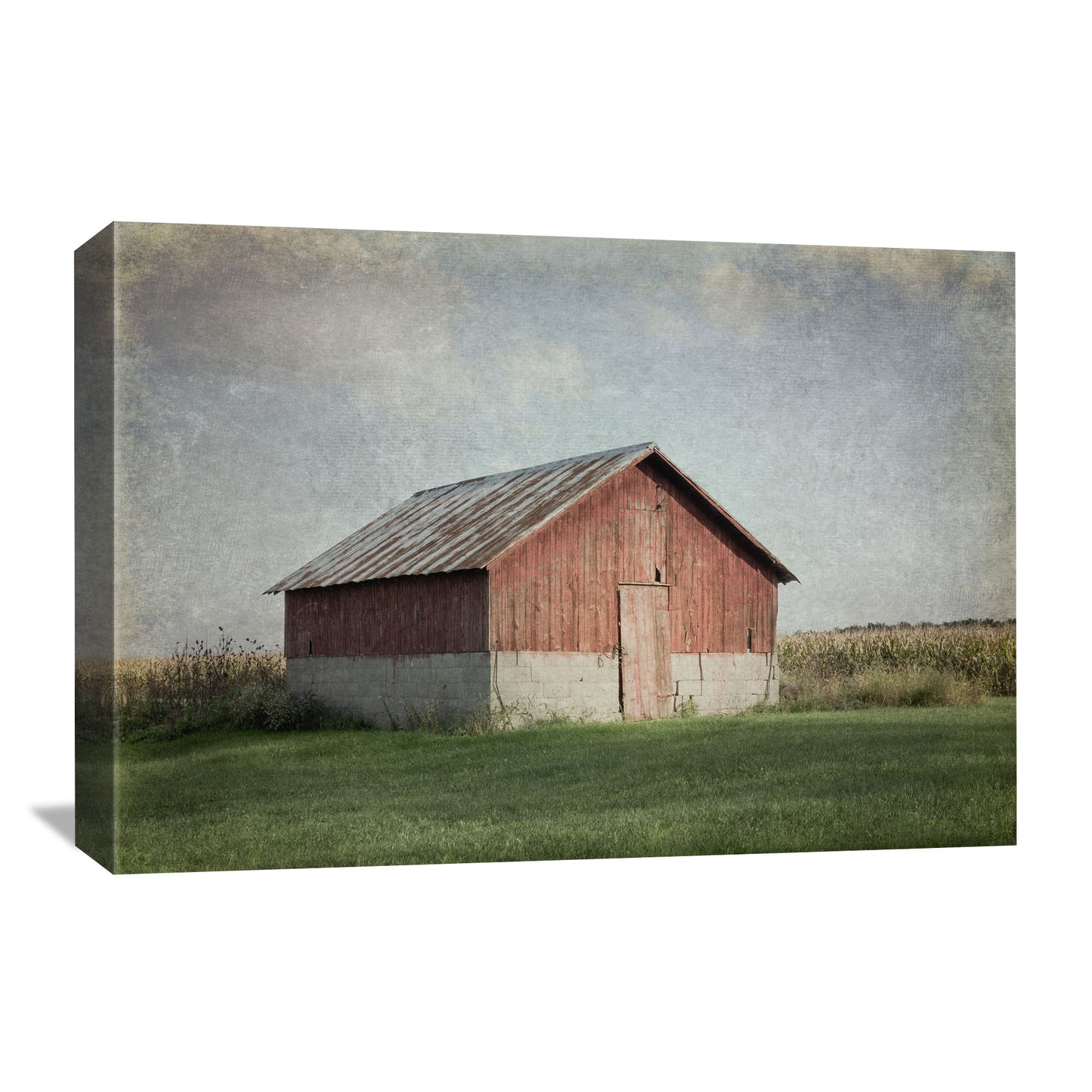 Farmhouse wall art featuring a old red barn in an antique/vintage style