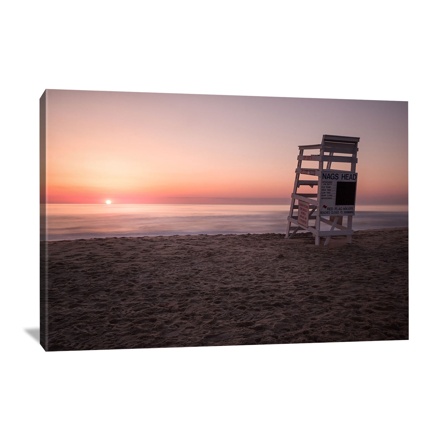 lifeguard chair at nags head beach during sunrise