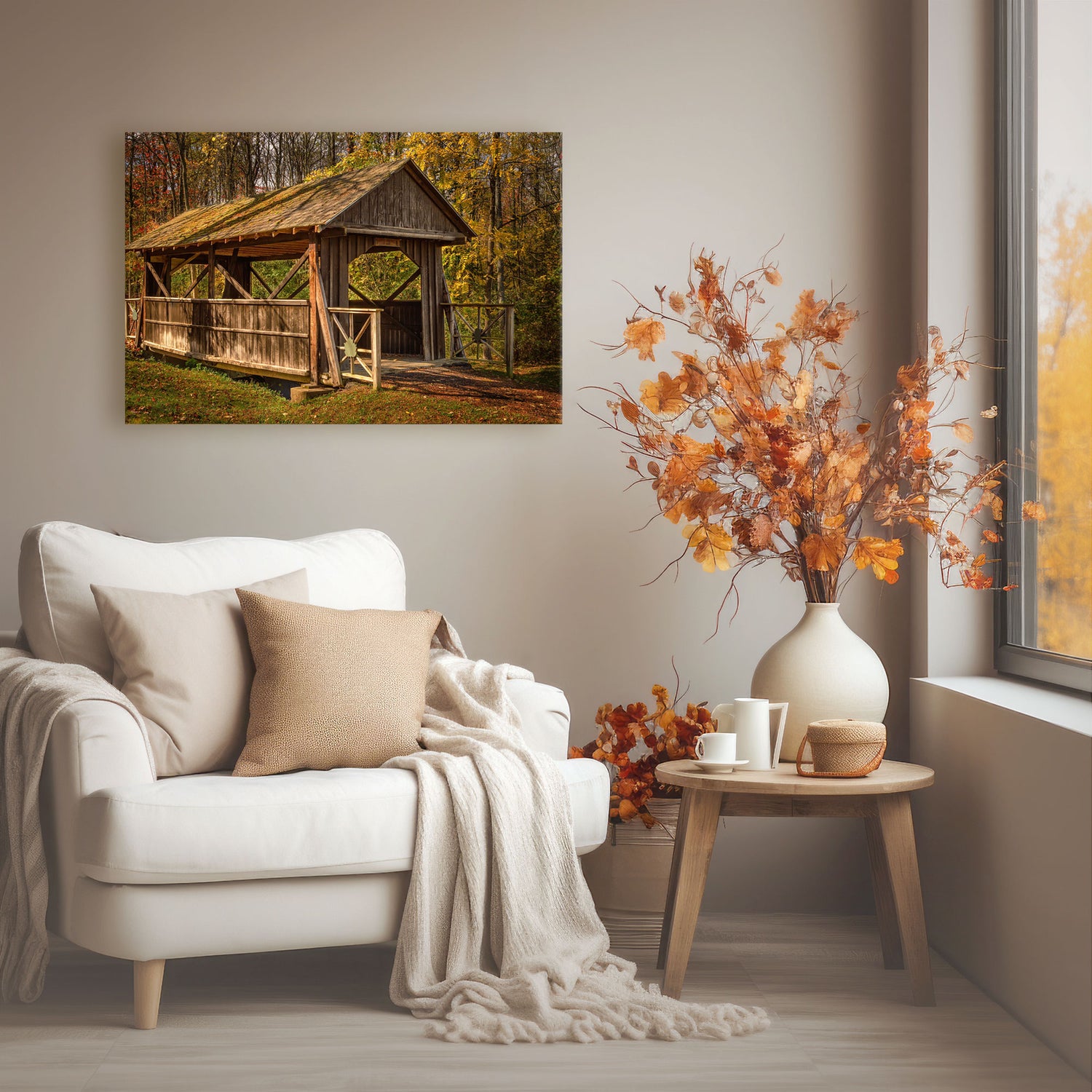 Autumn wall art featuring a covered bride in a colorful fall forest hanging over a chair