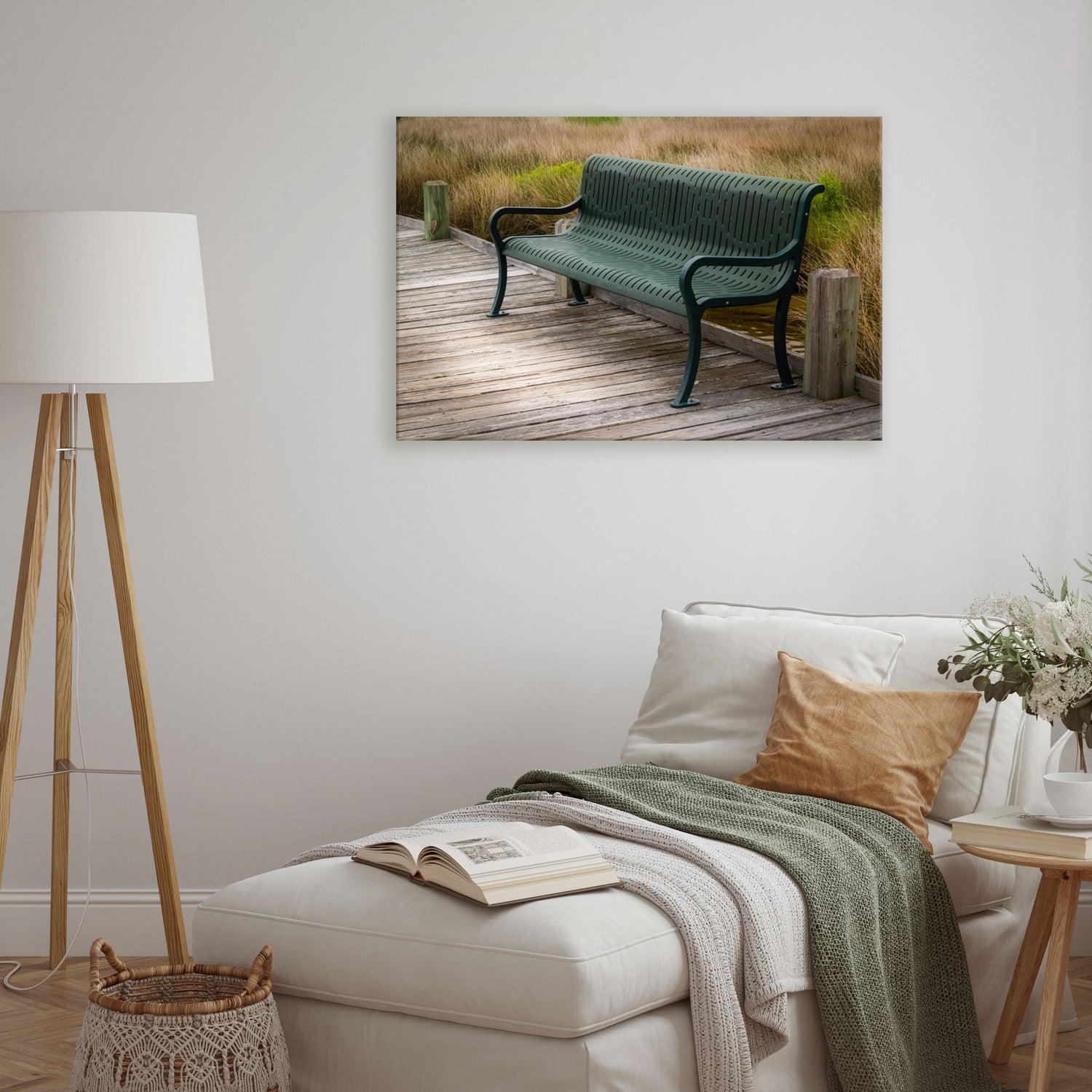 This canvas art provides a snapshot of a peaceful moment by the sea, featuring a seaside bench with tall seagrasses in the background.
