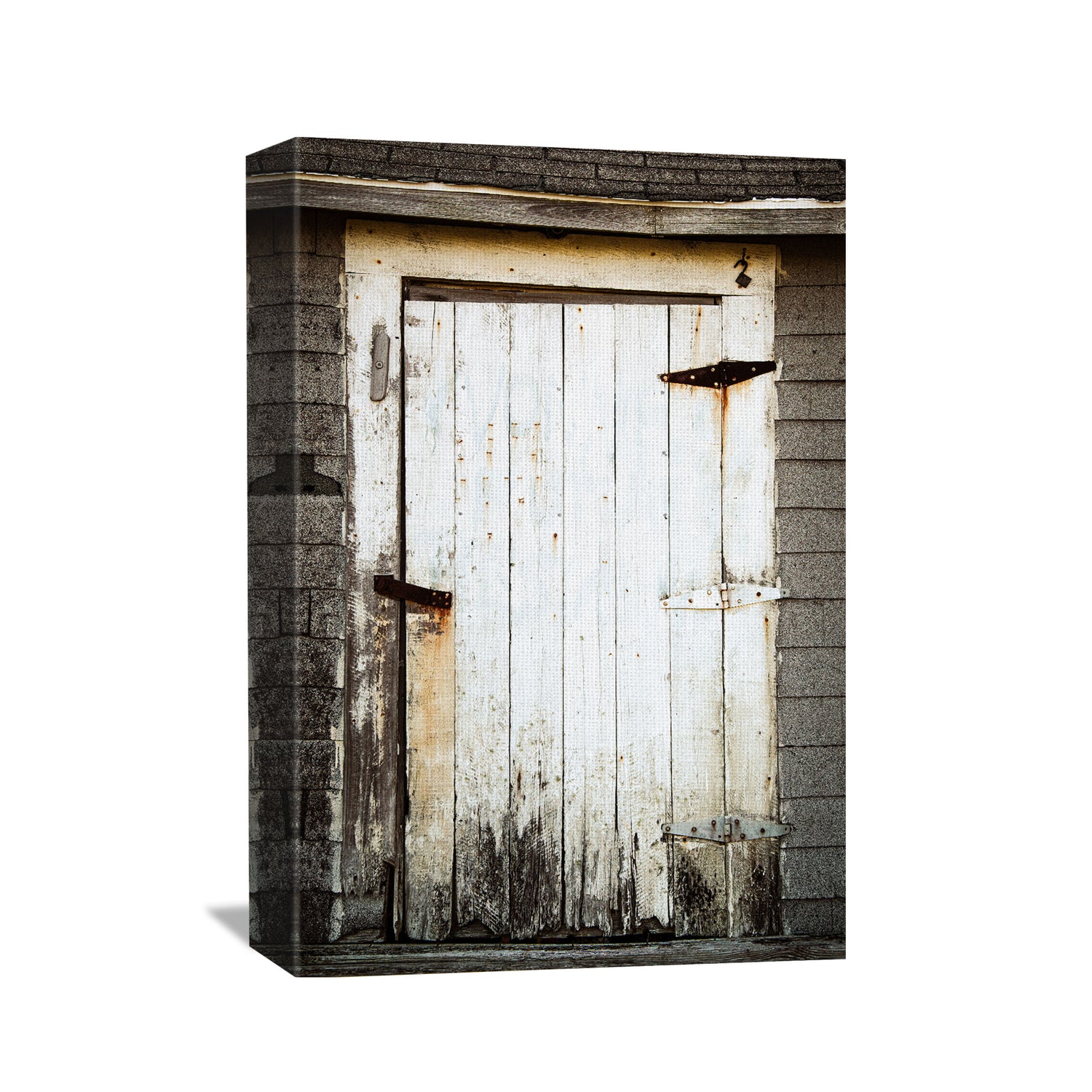 Durable canvas art piece portraying a sun-bleached, weathered door, an elegant blend of history and modern decor, displayed on a 1 1/2" deep canvas.