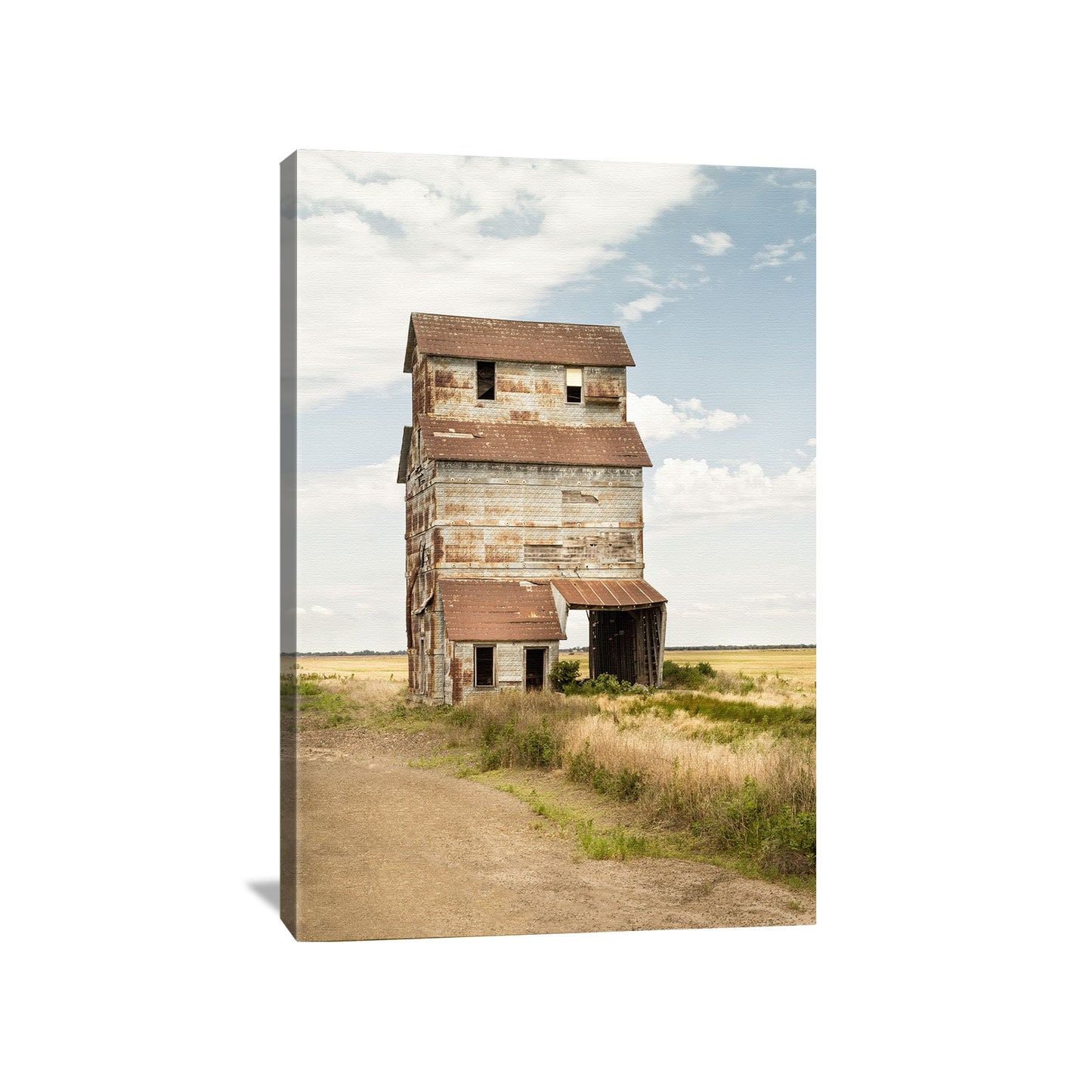 Modern farmhouse canvas print featuring an old Kansas grain elevator