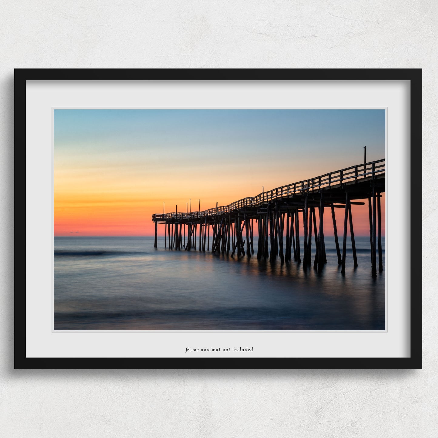 Image displaying a the wall art print within a thin black frame and white mat, meant to inspire potential display options. The actual product is the OBX print only; the frame and mat are not included with purchase.