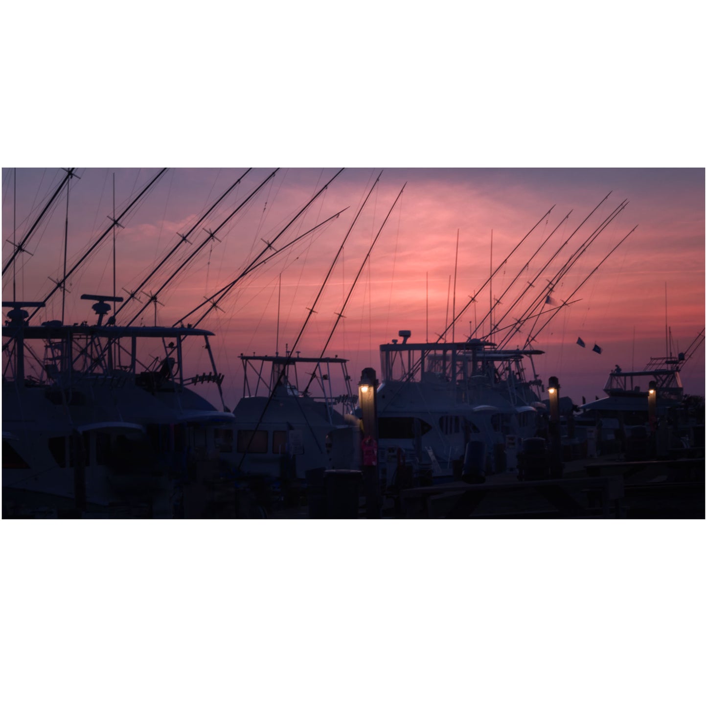 Outer Banks North Carolina wall art print featuring docked fishing boats at sunset