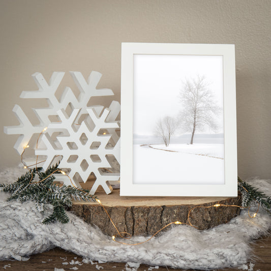 Winter nature photography art print featuring snow covered trees along the lake
